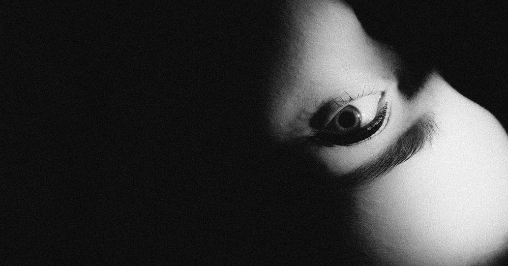 A photo of an eye on a black background